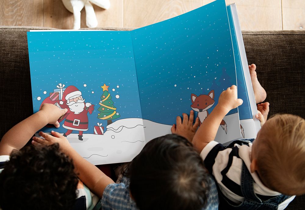 Young kids reading a Christmas story together