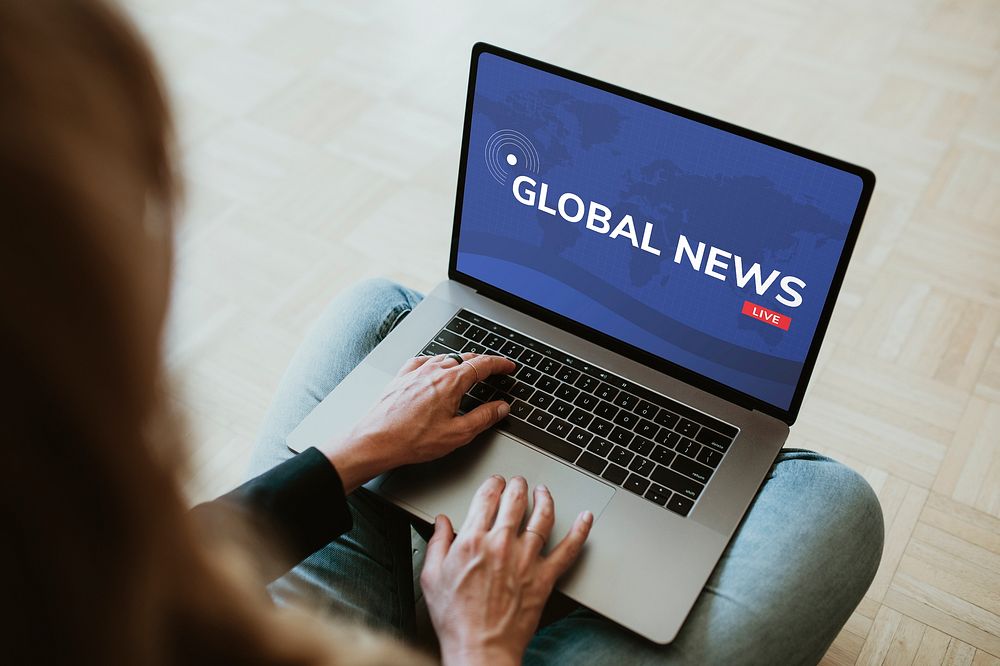 Global news on laptop screen