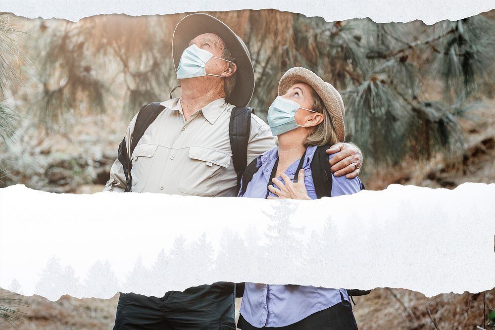 Lovely couple travel while wearing mask to protect themselves from covid-19 