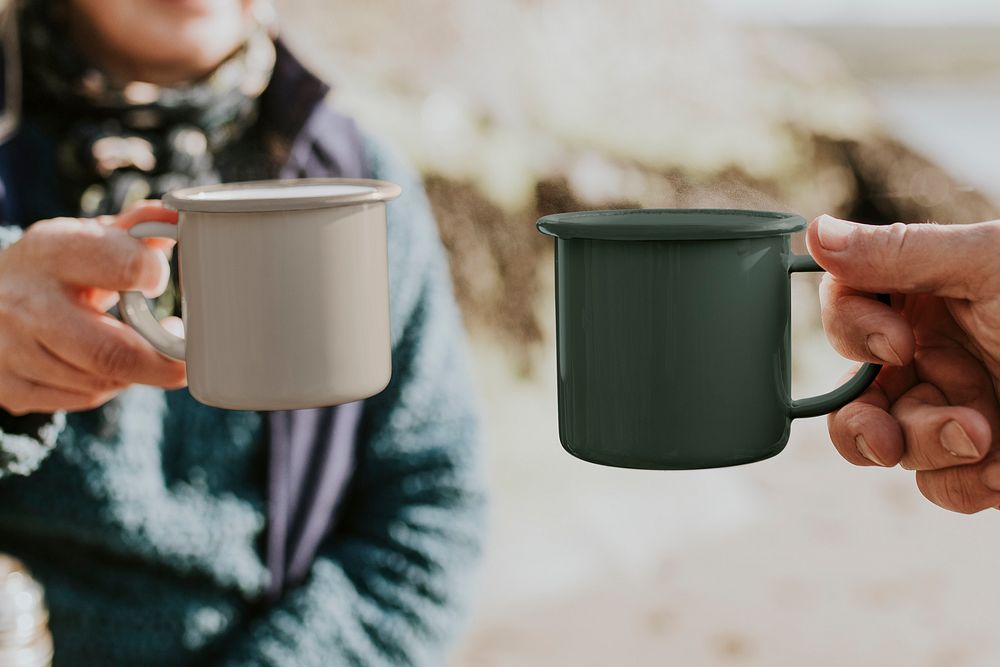 Campers drinking coffee, holding mugs