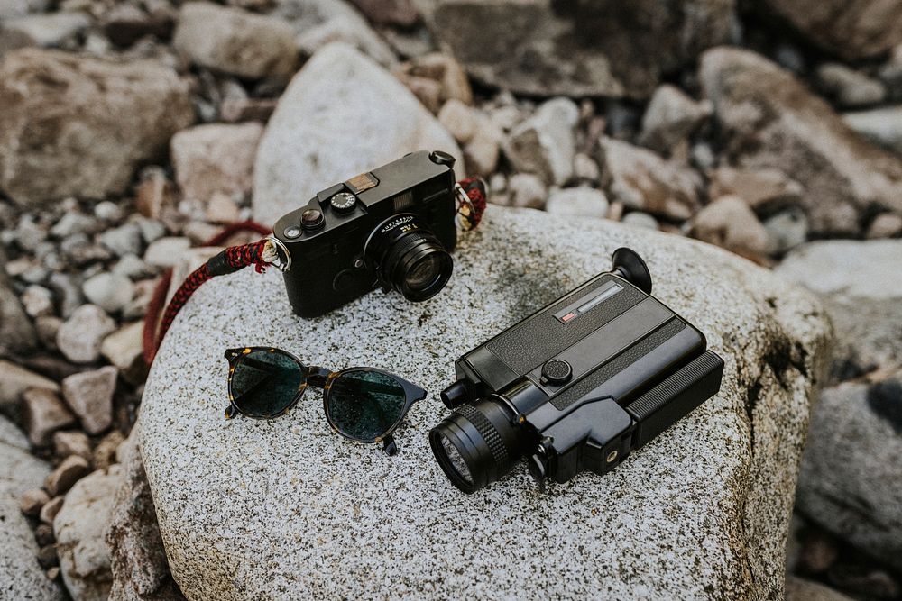 Analog cameras, vintage sunglasses aesthetic