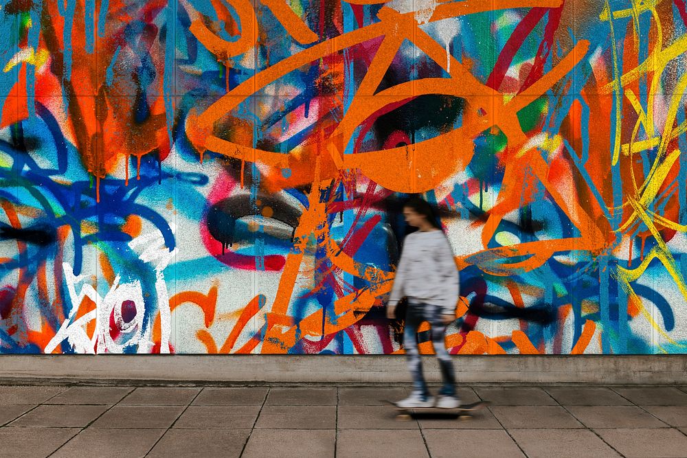 Aesthetic graffiti wall, woman skateboarding