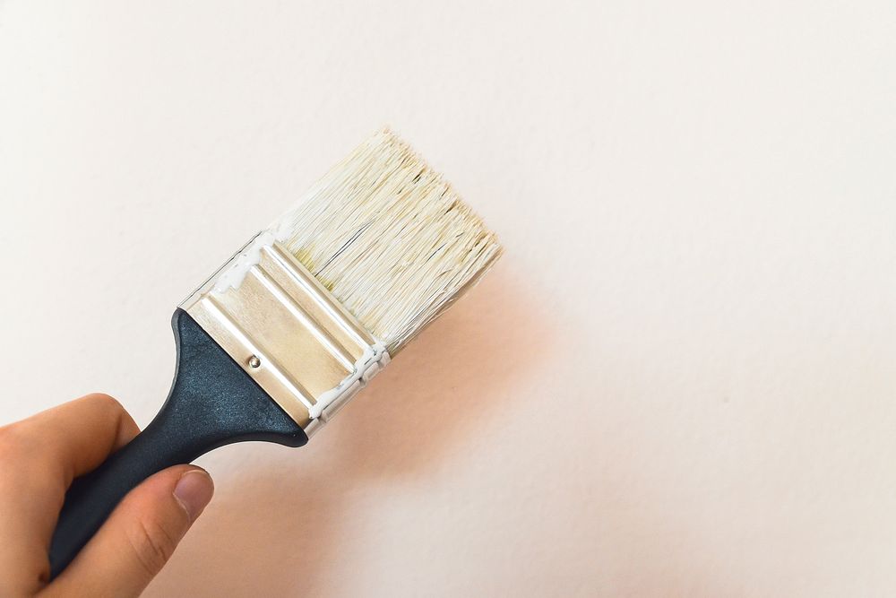 Close up decorating with paint brush