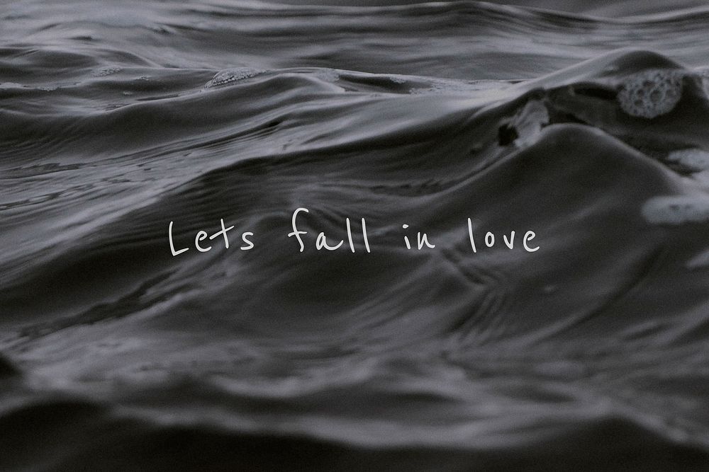 Let's fall in love quote on a water wave background