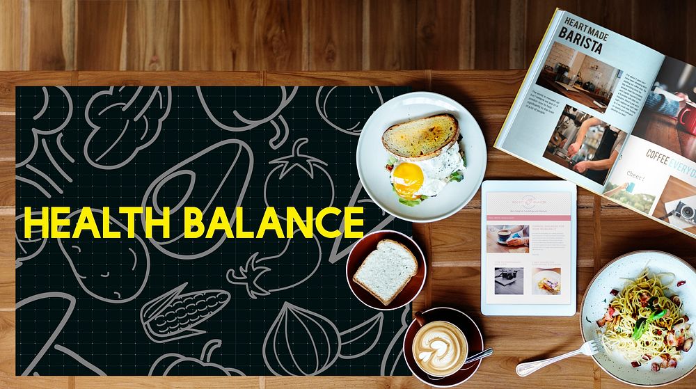 Breakfast meal on a wooden table and blackboard with vegetable icon