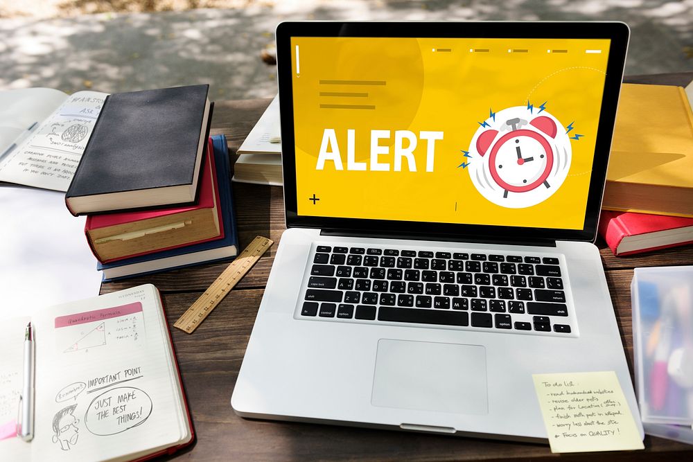 Illustrationr of alarm clock notification for important appointment on laptop