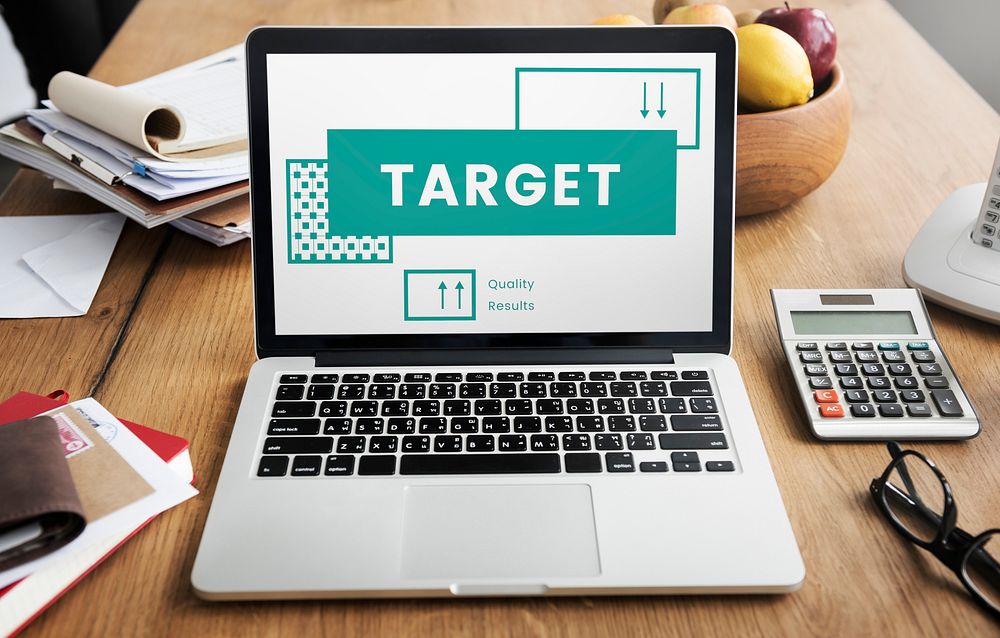 Business goals target process on laptop
