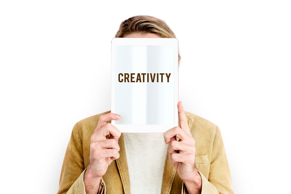 Creativity word tablet on face