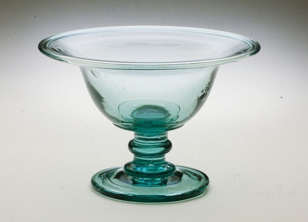sweet meat dish of light green glass with folded foot. Original from the Minneapolis Institute of Art.