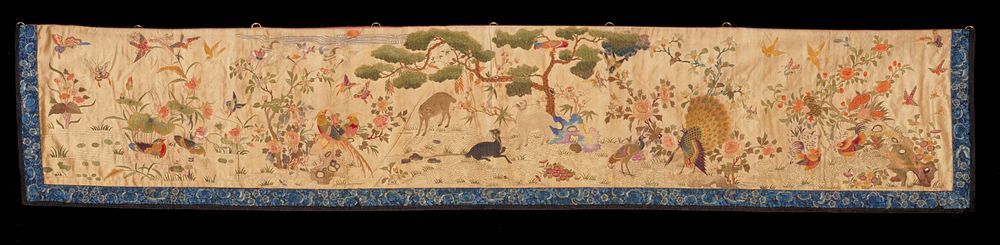 Temple banner. Ivory satin ground embroidered in colored silks with groups of birds and animals against a background of…