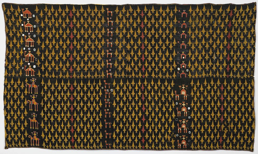 two horizontal panels sewn together; black with yellow and salmon-colored embroidery; cone-shaped, flower-like designs…