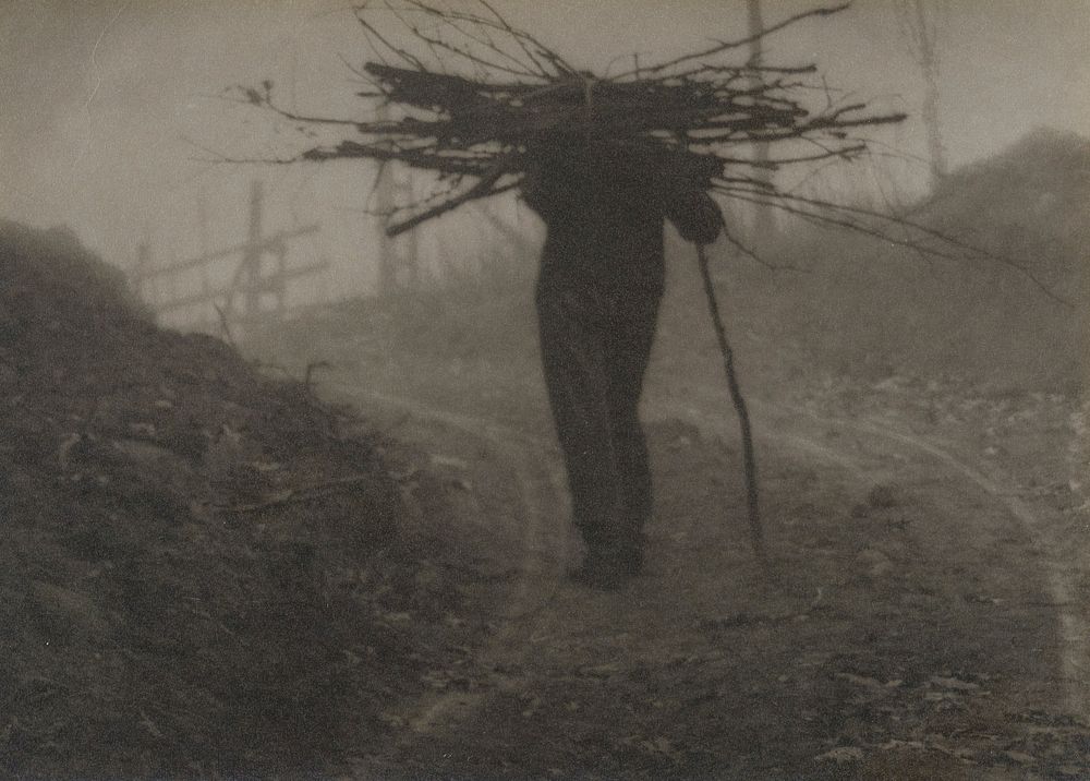 back view of man carrying bundle of sticks on his back; mounted to board. Original from the Minneapolis Institute of Art.