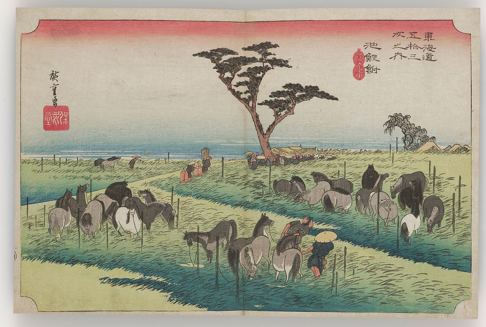 field of long grasses with a variety of horses tethered to stakes; a few people tending the horses; small complex of…