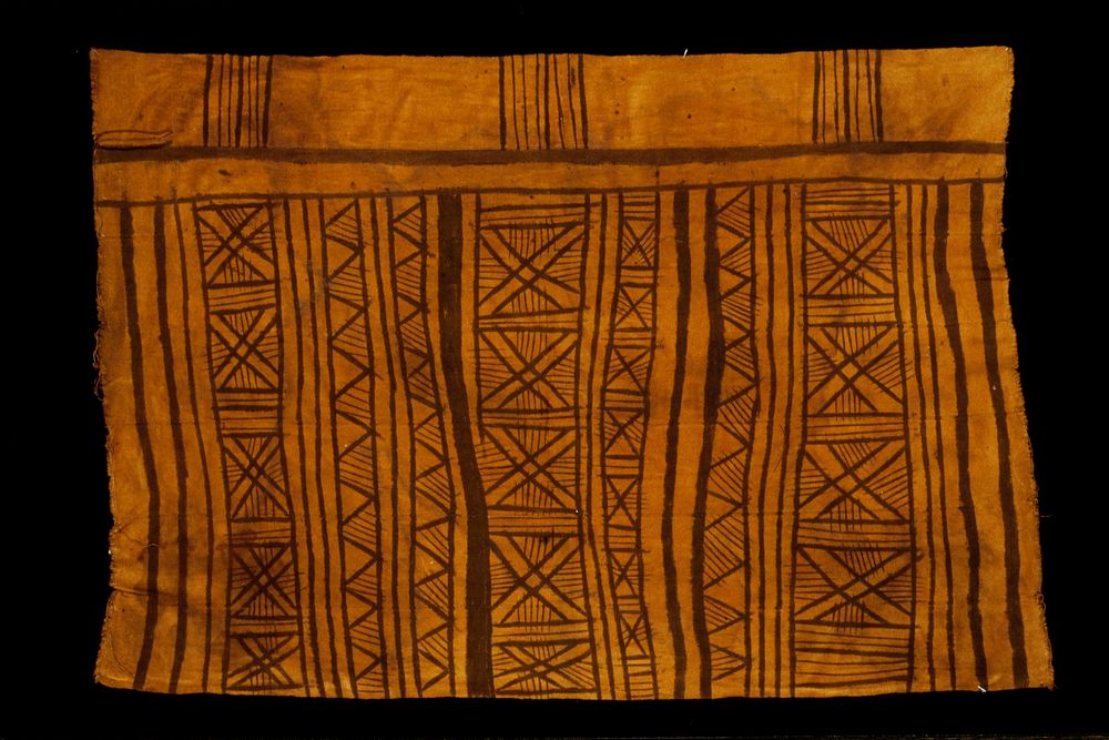 mud-dyed skirt, strip cloth fabric, ochre; cotton, mud dye. Original from the Minneapolis Institute of Art.