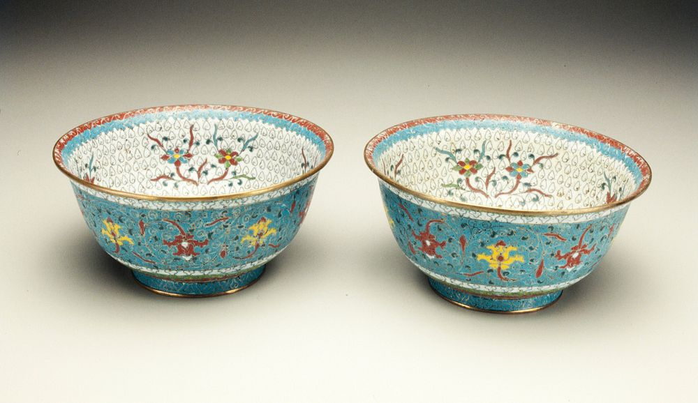 light blue ground decorated in colors with floral meanders on carved wooden stand. Original from the Minneapolis Institute…