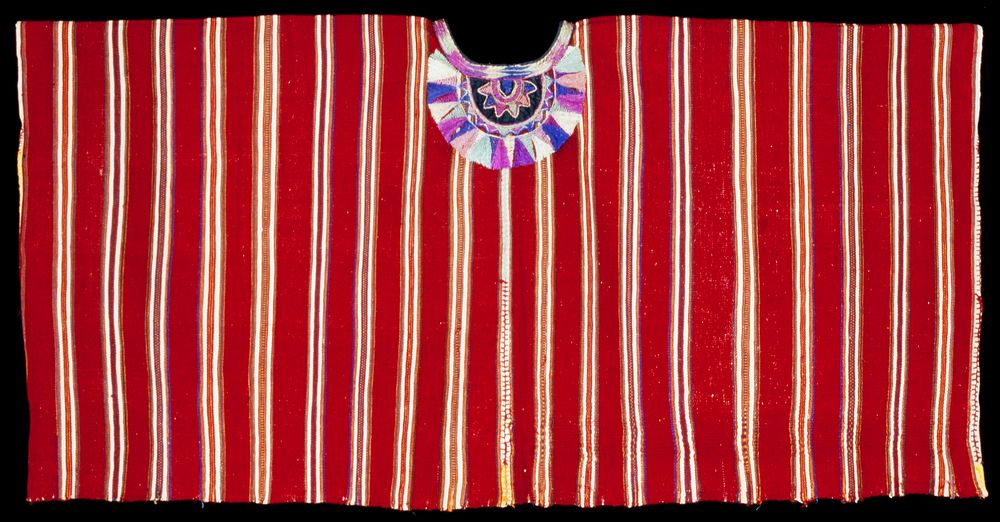 Two panel huipil; randa and embroidered side seams; appliqué and embroidered neckline, rosette with radiating triangles; red…