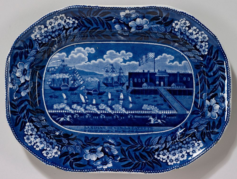 platter; pottery not porcelain ; soft-paste porcelain with a commemorative scene of Lafayette landing in new york(1824) in…