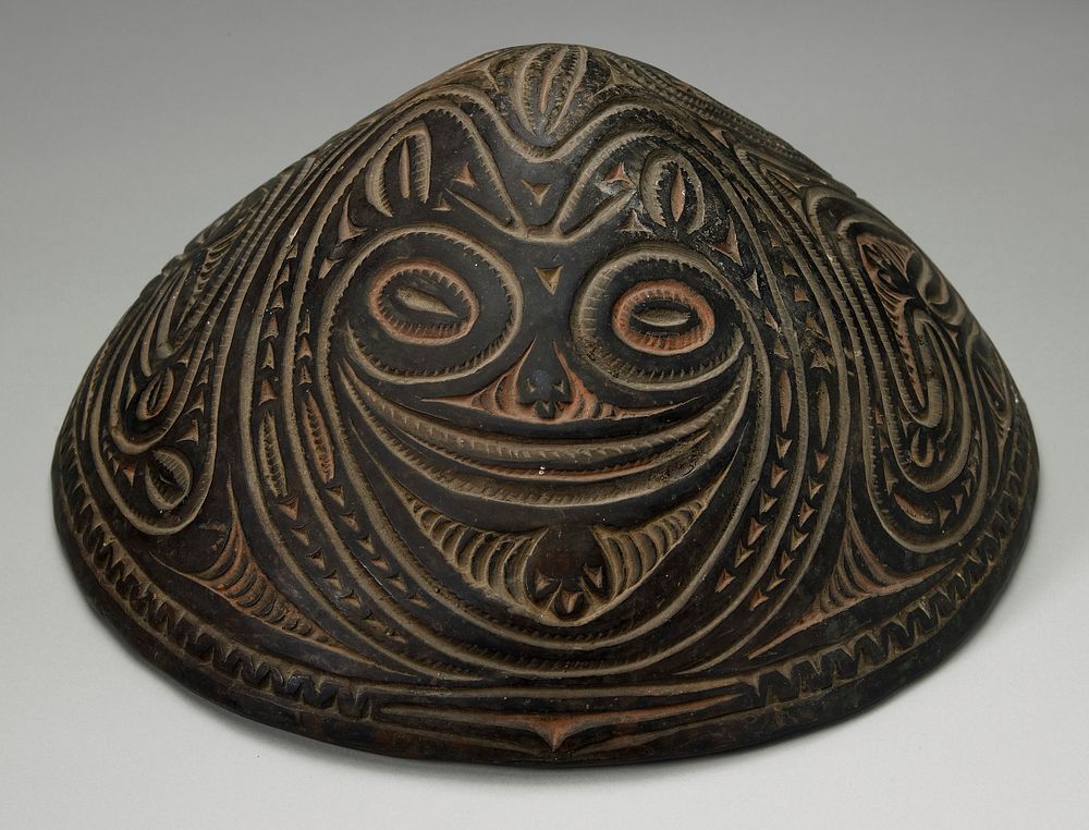 conical food dish; incised whirl decoration and two faces; Wombun Village. Original from the Minneapolis Institute of Art.