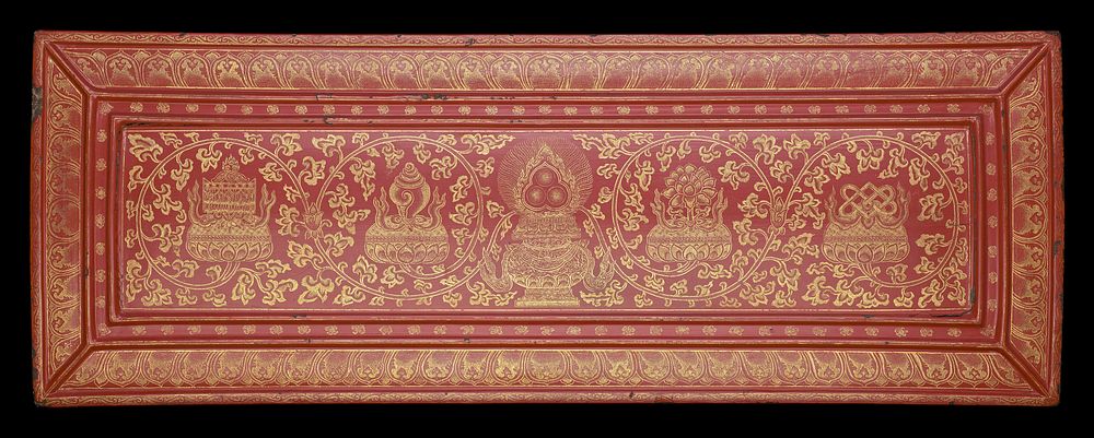 Red lacquer panel, carved and inlaid with gold; compartmentalized top with organic repeating designs around edges; central…