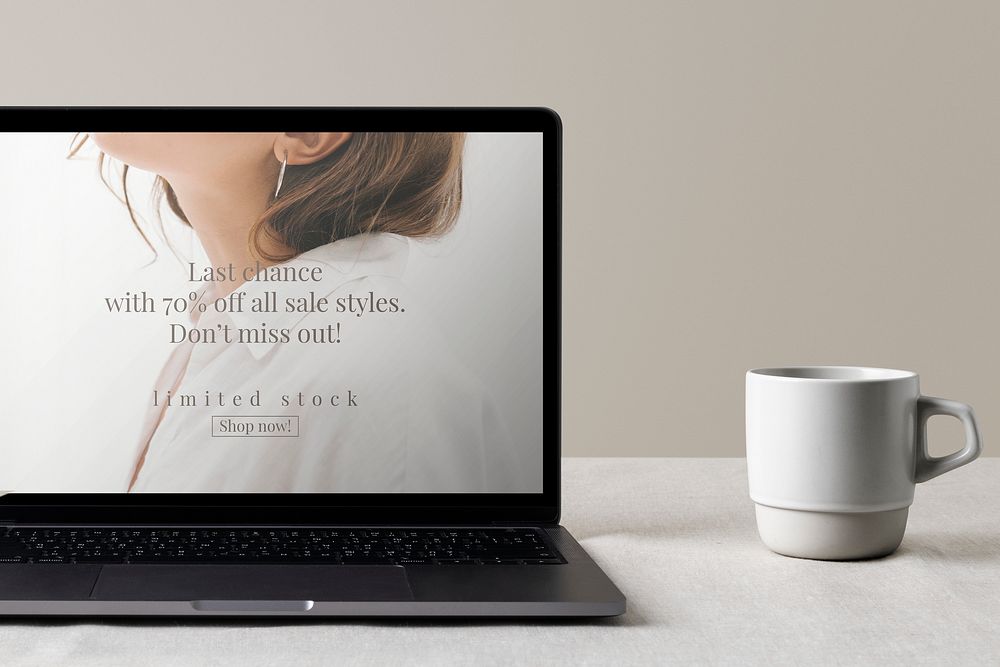 Laptop computer mockup psd, modern home interior decor, cup of coffee