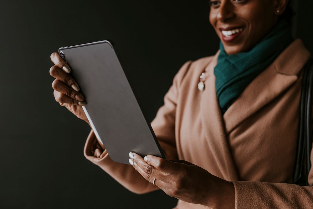 Businesswoman video calling on tablet