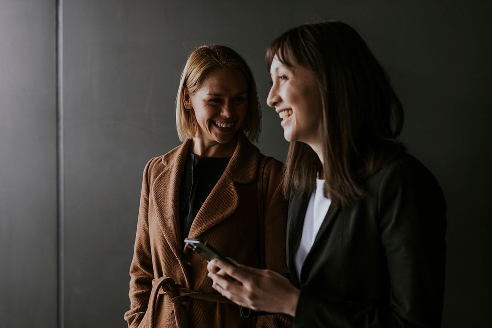 Businesswomen chatting with her phone