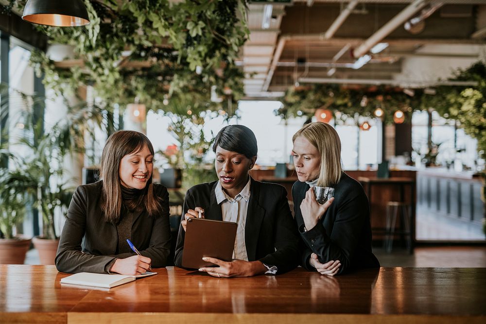 Business colleagues working together, co-working space photo