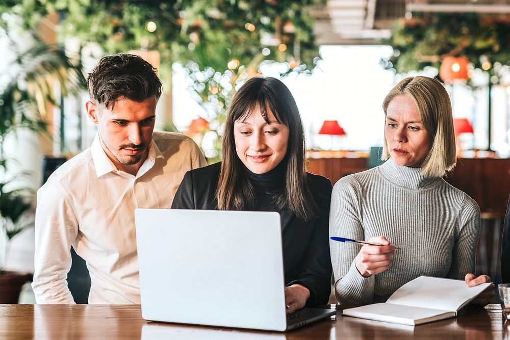 Business colleagues working together, co-working space photo