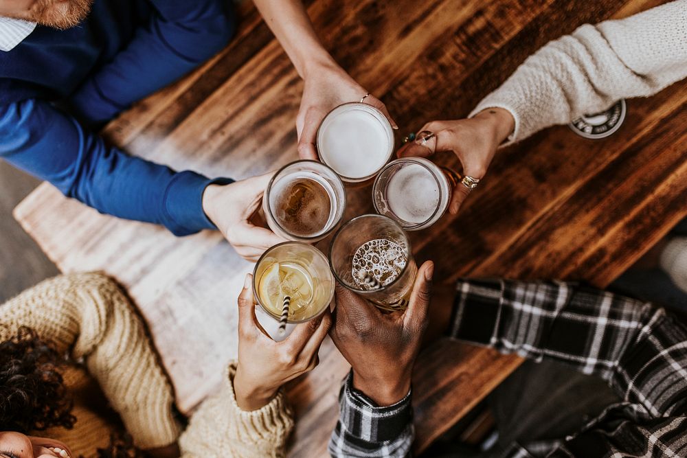 Friends toasting with beer, celebration photo