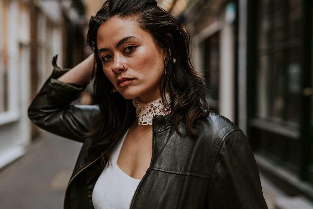 Woman wearing leather jacket, street fashion