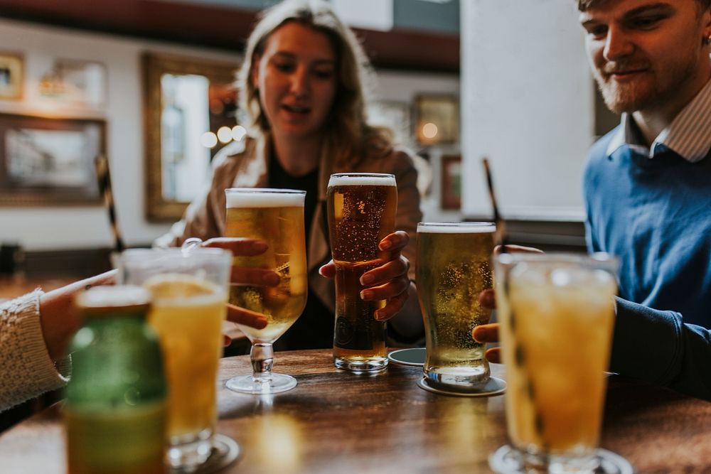 Friends pub hangout, drinking beer 