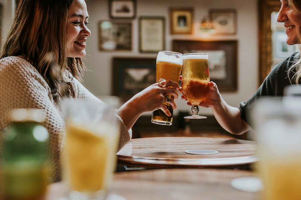 Friends toasting with beer, celebration photo