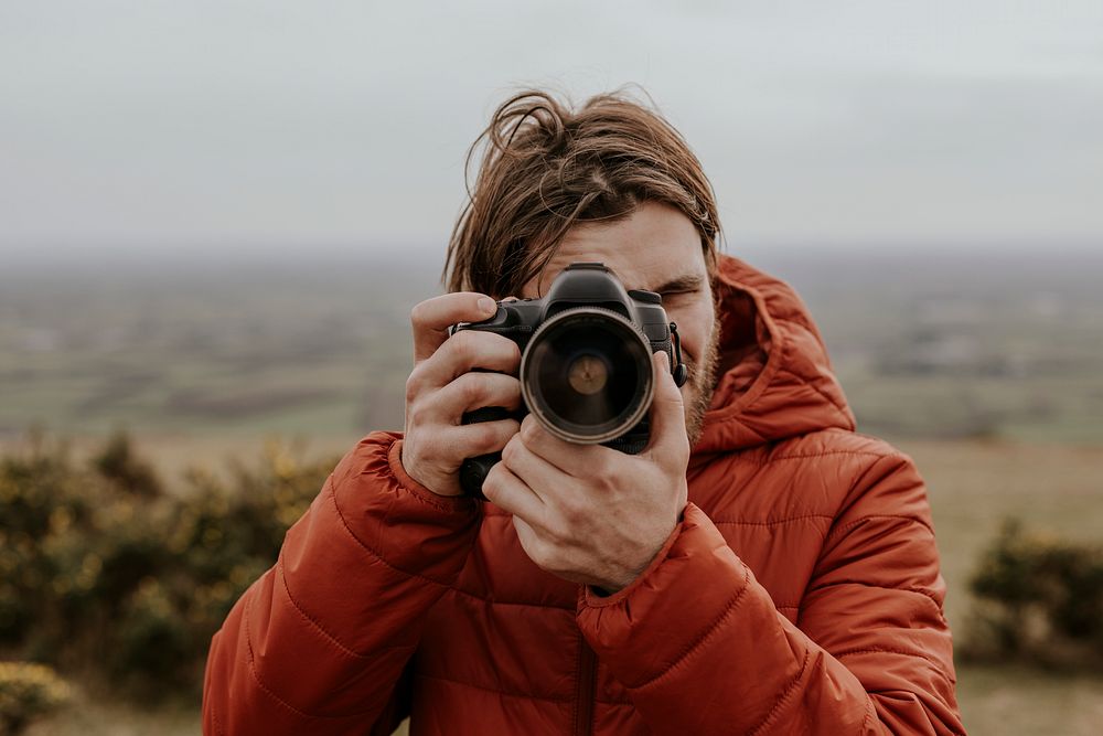 Photographer taking pictures of nature