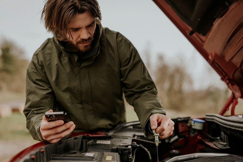 man-trying-fix-broken-car-premium-photo-rawpixel