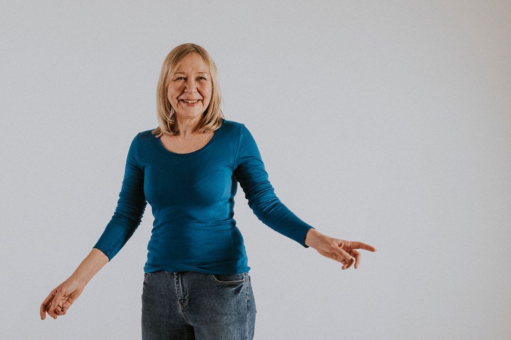 Mature woman in blue t-shirt and jeans