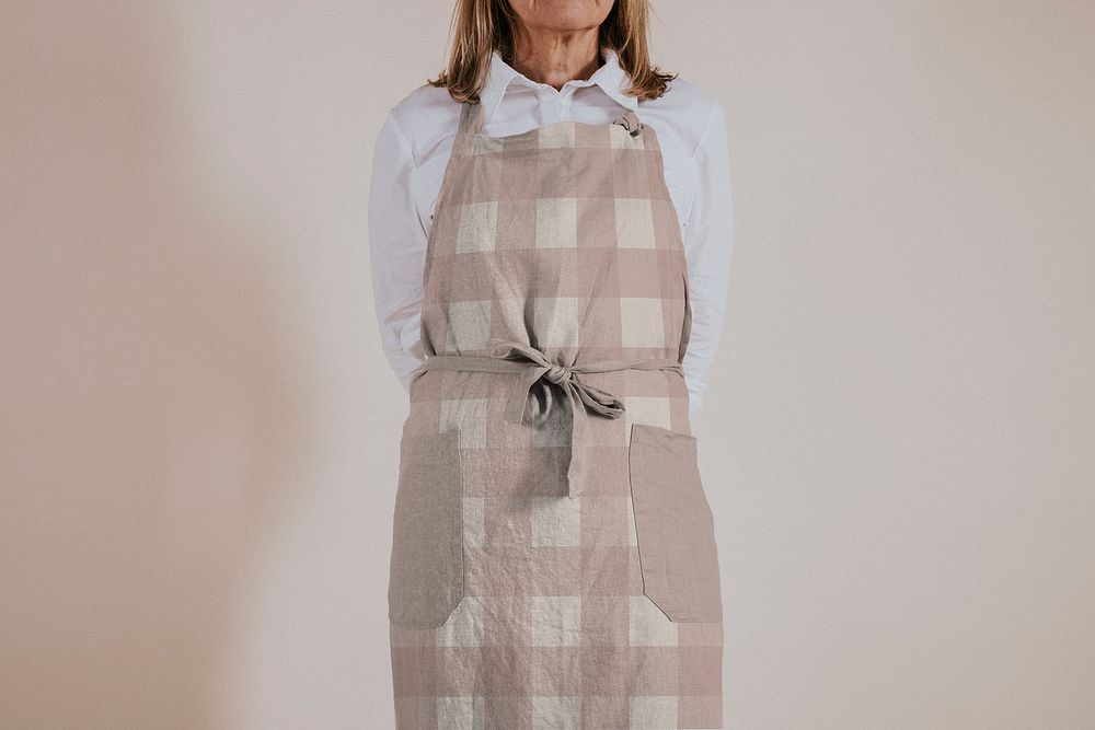 Woman wearing brown apron, studio | Premium Photo - rawpixel