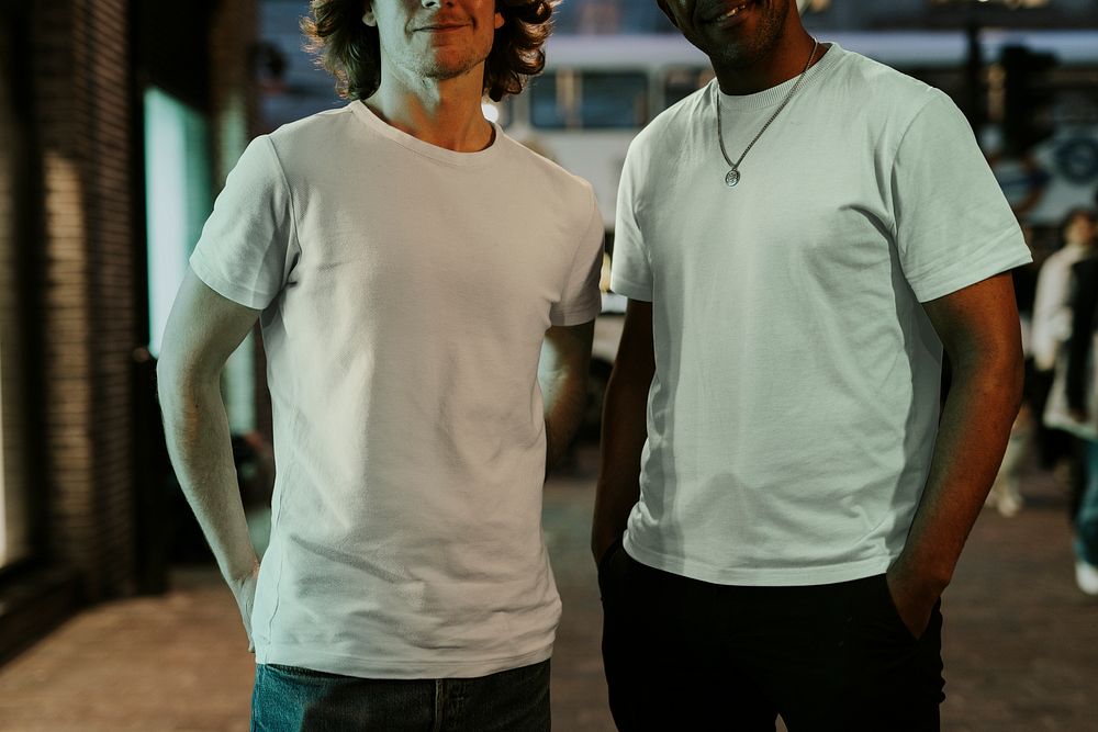 Men wearing T-shirt on street at night photo