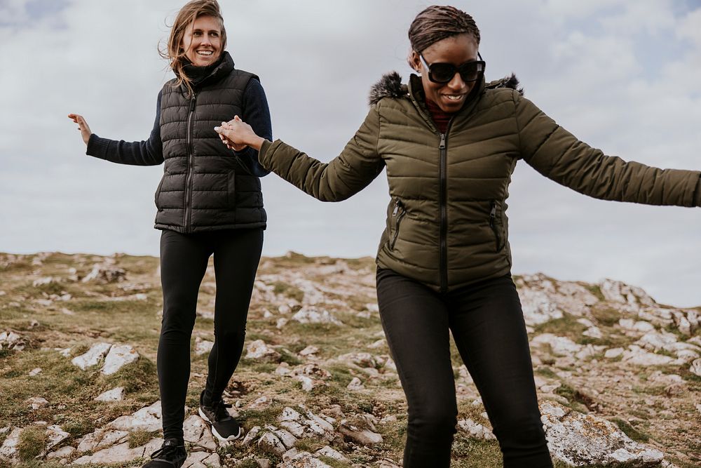 Happy women hiking together, outdoor activity