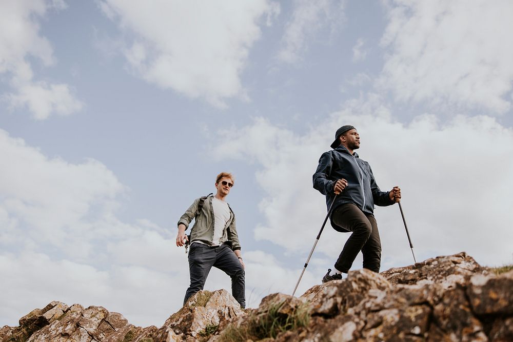 Men hiking on mountain, outdoor activity photo