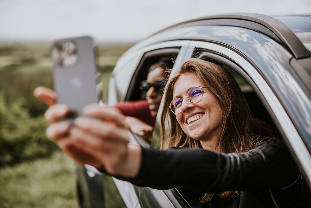Women selfie on road trip photo