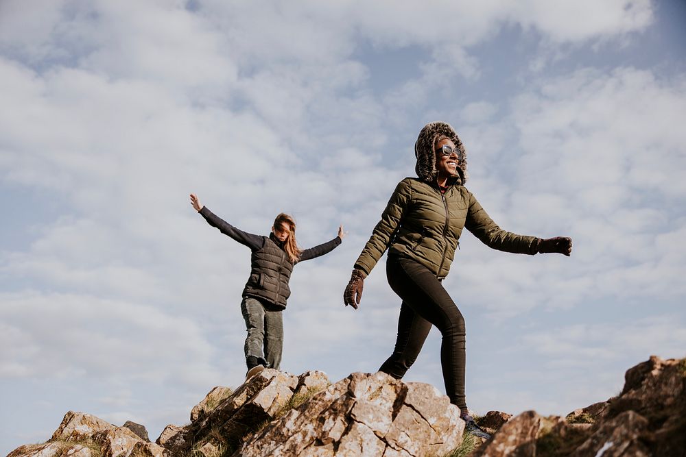 Women walking on mountain, outdoor activity photo