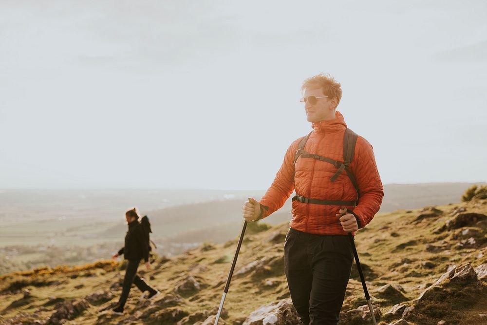 Man hiking on mountain. outdoor activity photo