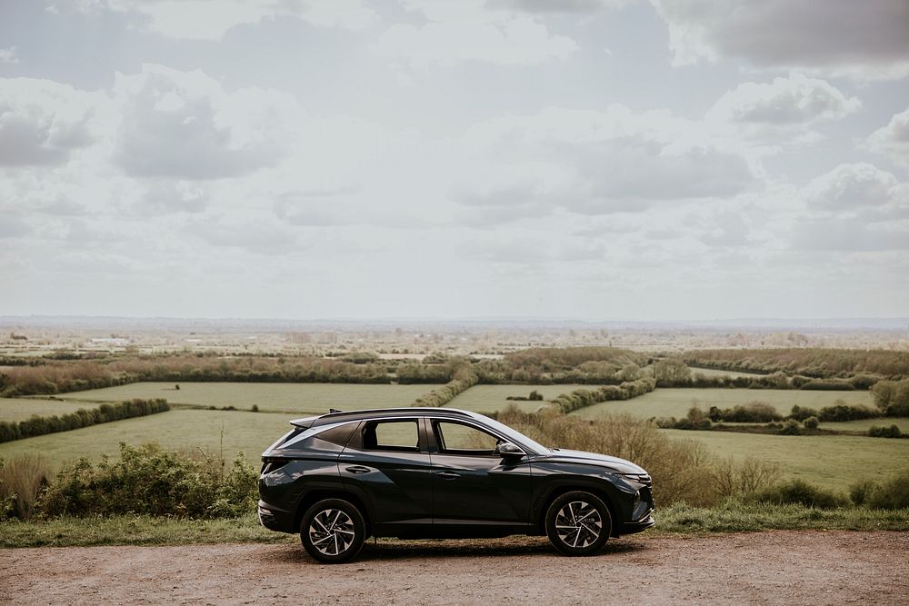 Car on hill road photo