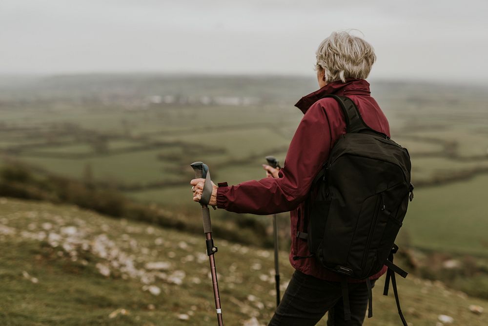 Senior woman hiking the mountain