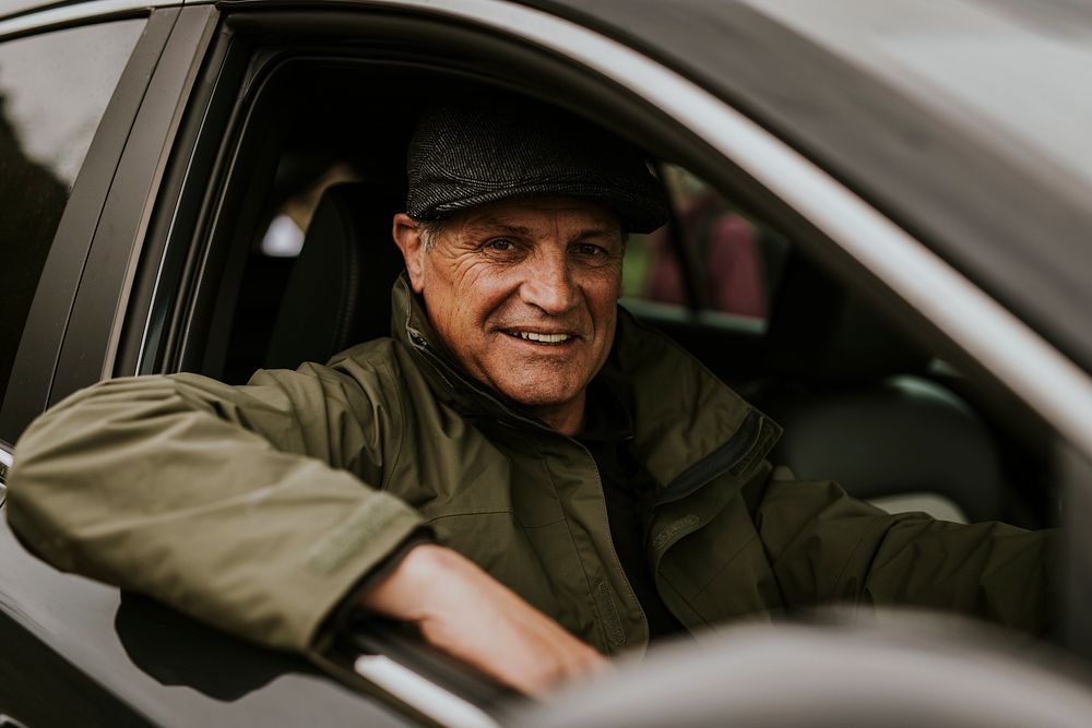 Senior man driving his car