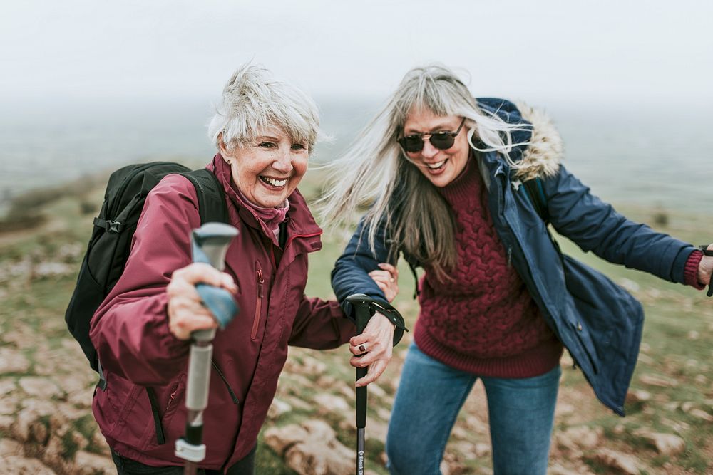 Happy senior women hiking, outdoor activity