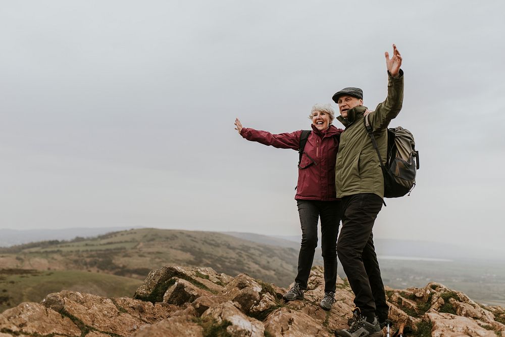 Happy senior couple on mountain top