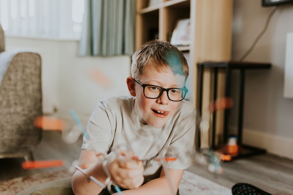 Boy playing buzz wire game