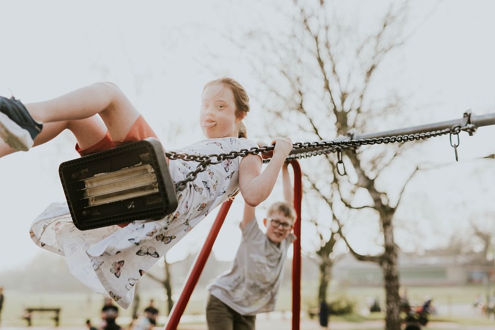 Girl with Down Syndrome on a swing