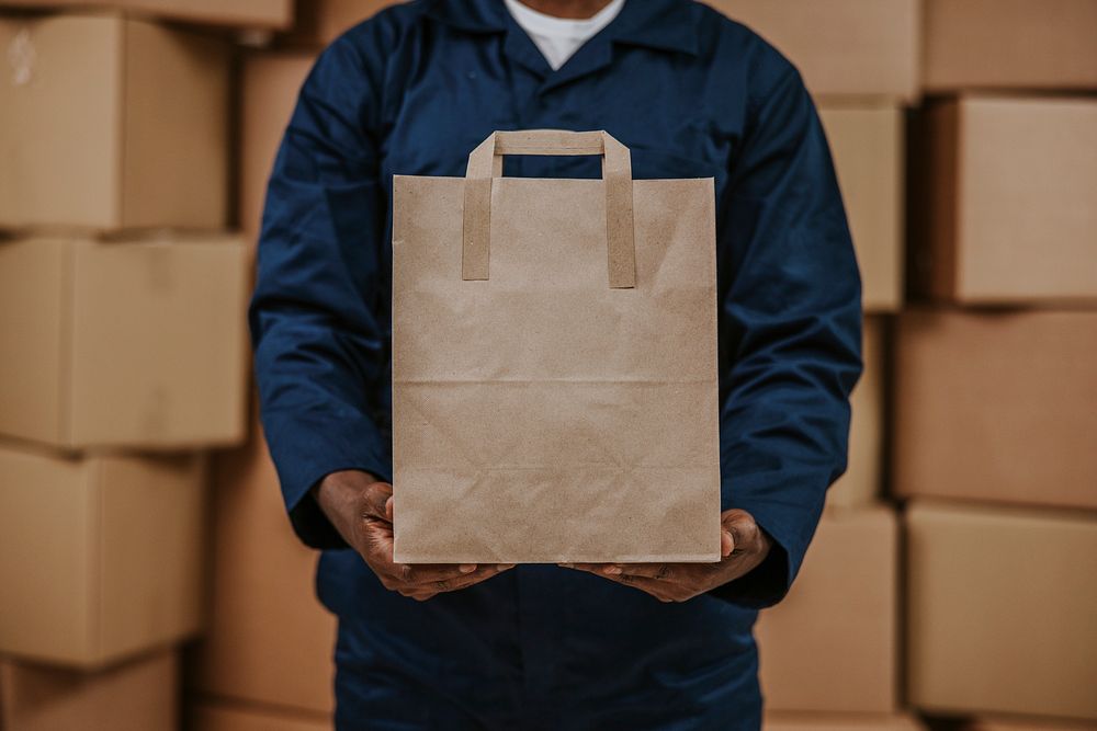 Food delivery man holding bag